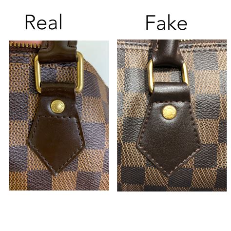 how to spot a fake louis vutton bag|how to tell if a louis vuitton bag is real.